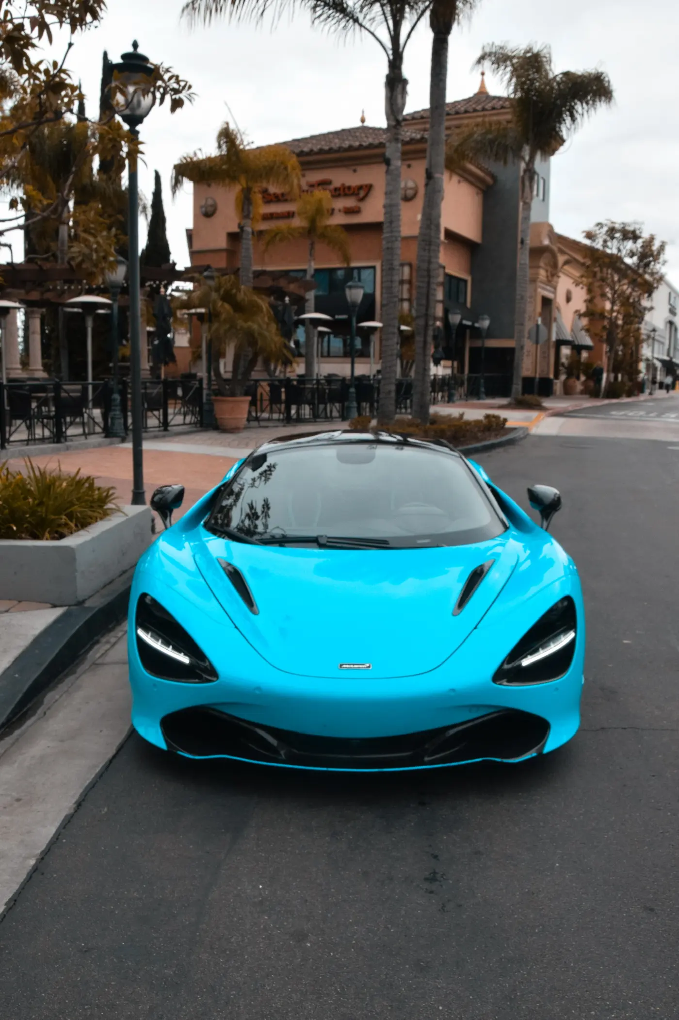 McLaren 720S in aqua teal, mid-range of the San Diego exotic rental fleet