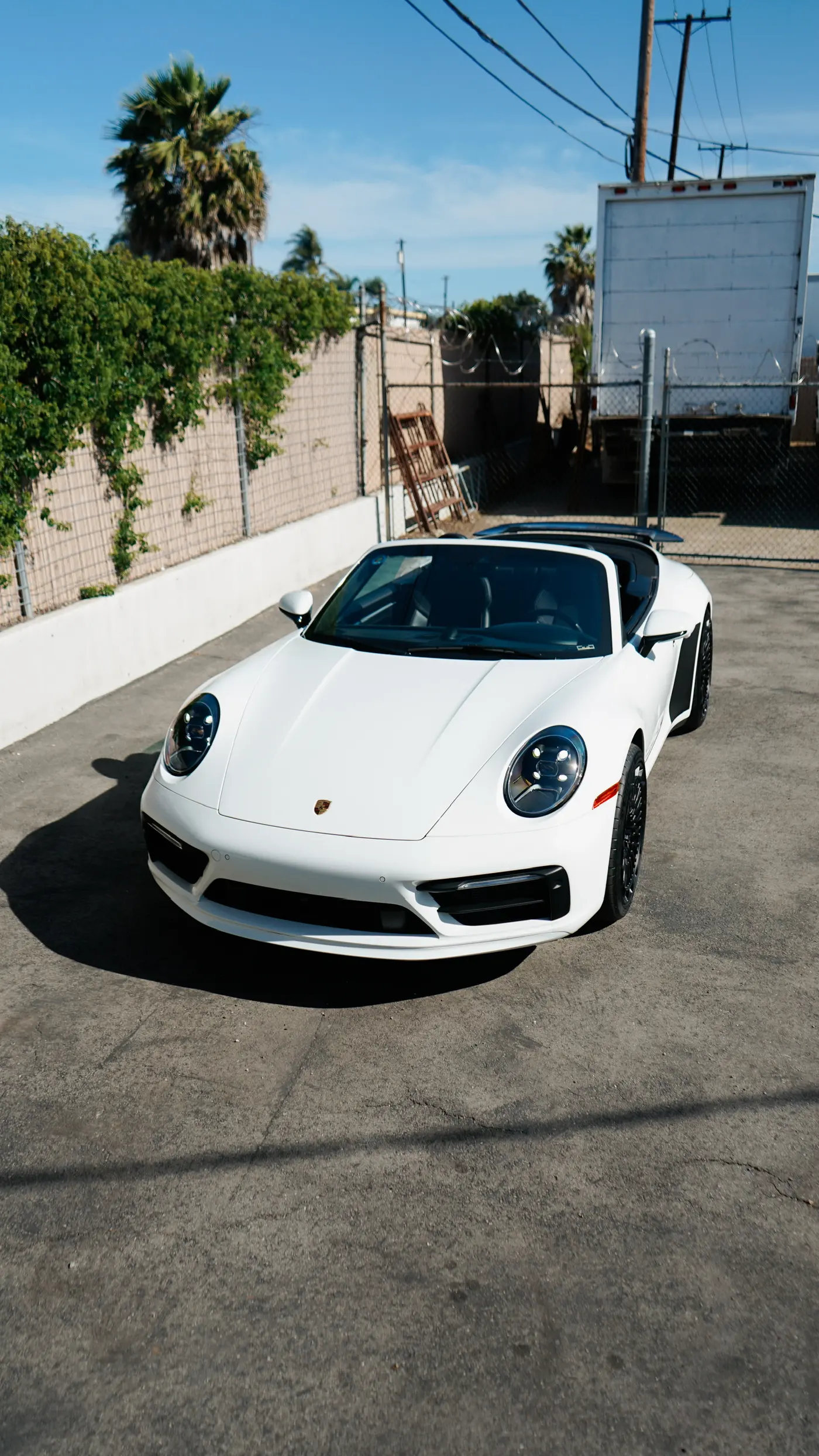 2024 Porsche 911 Carrera 4S Convertible — front view, available for rental in San Diego